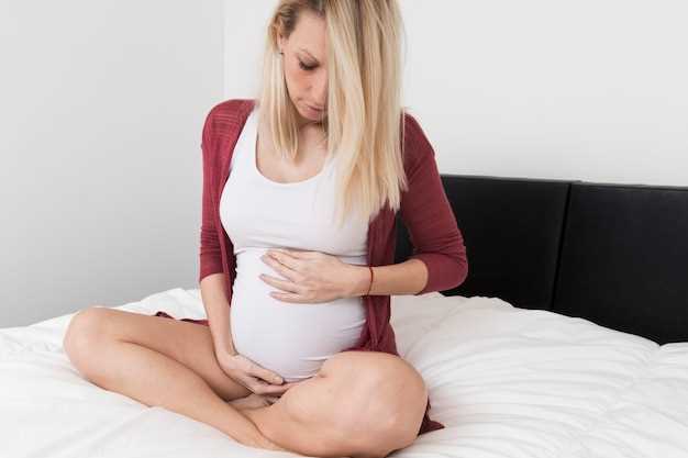 Почему неприятные ощущения в нижней части живота возникают после зачатия?